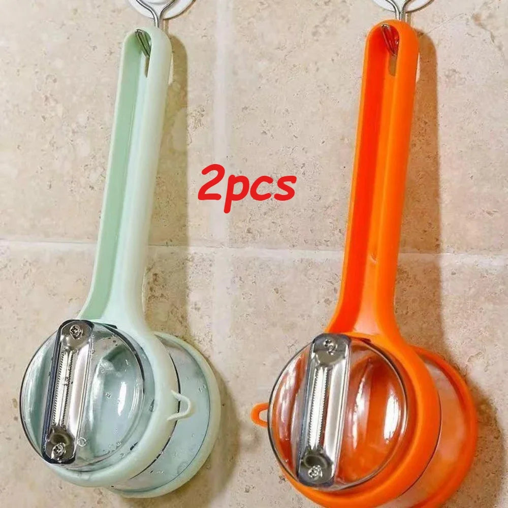 Durable stainless steel peeler for fruits and vegetables, featuring a double-sided blade and a protective storage case for safe, easy use